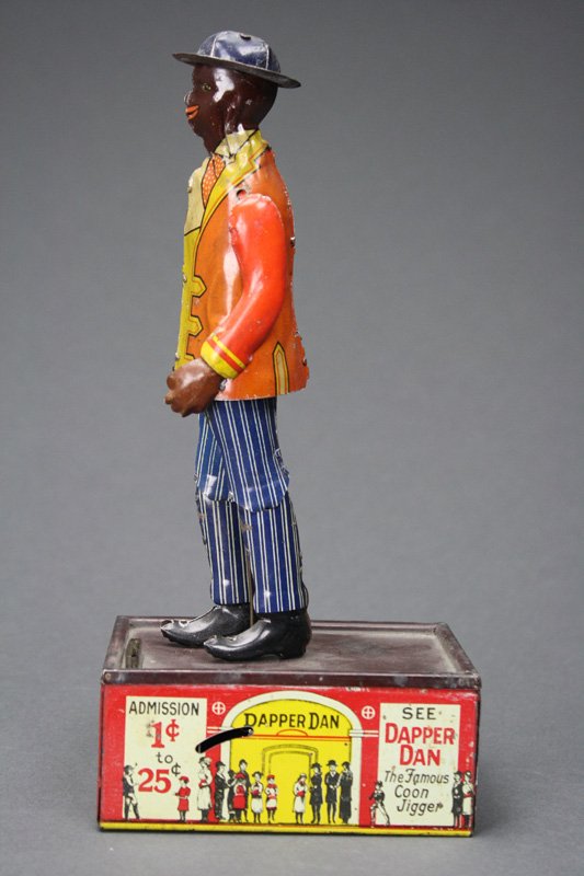 Dapper Dan Mechanical Bank: Louis Marx Company • New York, New York – Circa 1910 This is a classic jigging dancer that is activated when a coin is deposited to the slot. Works quite well. Material: Tin