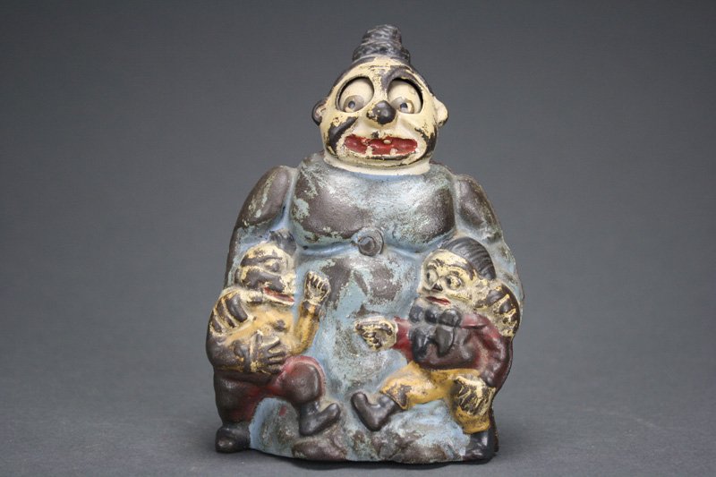 Mama Katzenjammer - 1930’s Forgery Mechanical Bank: The Selafian Brothers Pennsylvania - Circa 1935 This is a collectible forgery made by two brothers in the Philadelphia area. They forged other banks including the Boy Robbing Birds Nest, the Boy Steal