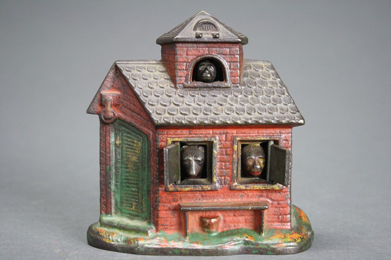 Zoo Bank Mechanical Bank: Made by Kyser & Rex Company Philadelphia, Pennsylvania – Circa 1880 Without a doubt, the Zoo Bank is the smallest and cutest bank ever produced. Place a coin in the roof dormer and press the monkey�