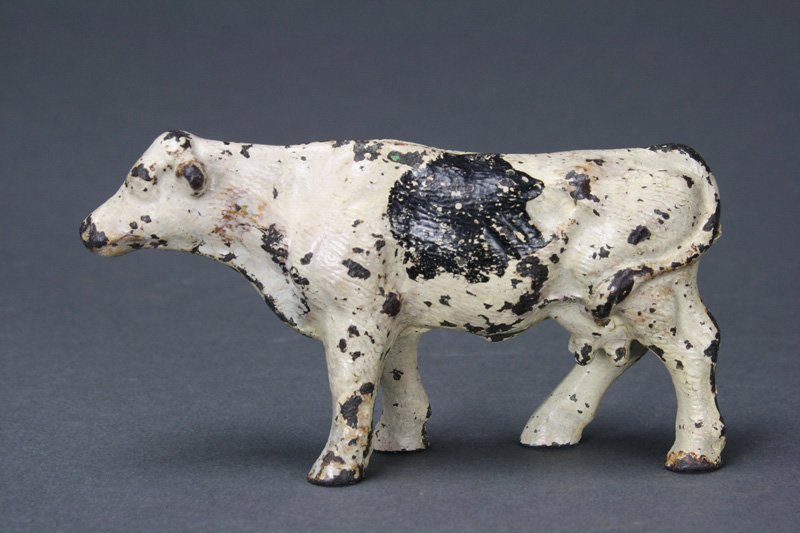 Holstein Cow Still Bank: Arcade Mfg. - Circa 1915 Material: Cast Iron