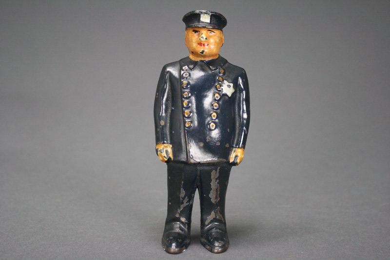 Policeman Still Bank: Arcade Mfg. Co. Illinois - Circa 1925 Material: Cast Iron