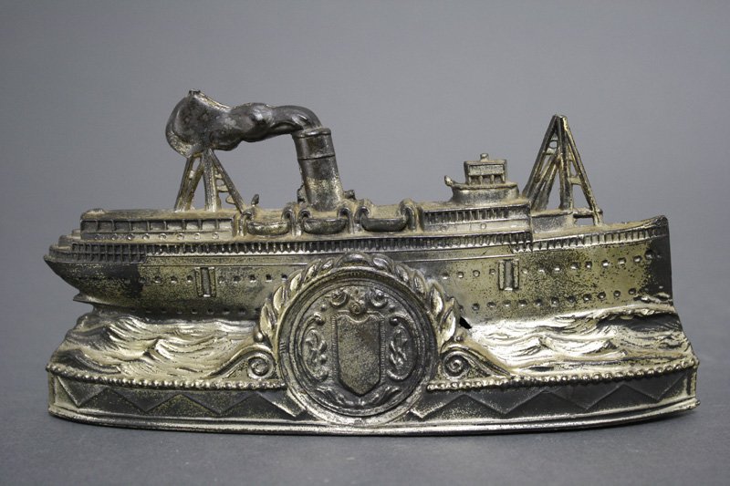 Single Funnel Ocean Liner Still Bank: Germany - Circa 1930 This is a classic silvered lead Ocean Liner that is 7 1/2â€ long. Material: Silvered Lead