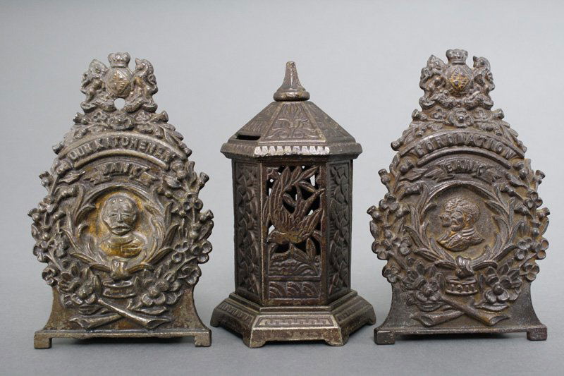 Lot: Three English Banks Still Banks: Sydenham & McOustra - Circa 1915 Included is an Our Lord Kitchener, Space Heater with Birds and a Coronation Bank. Material: Cast Iron