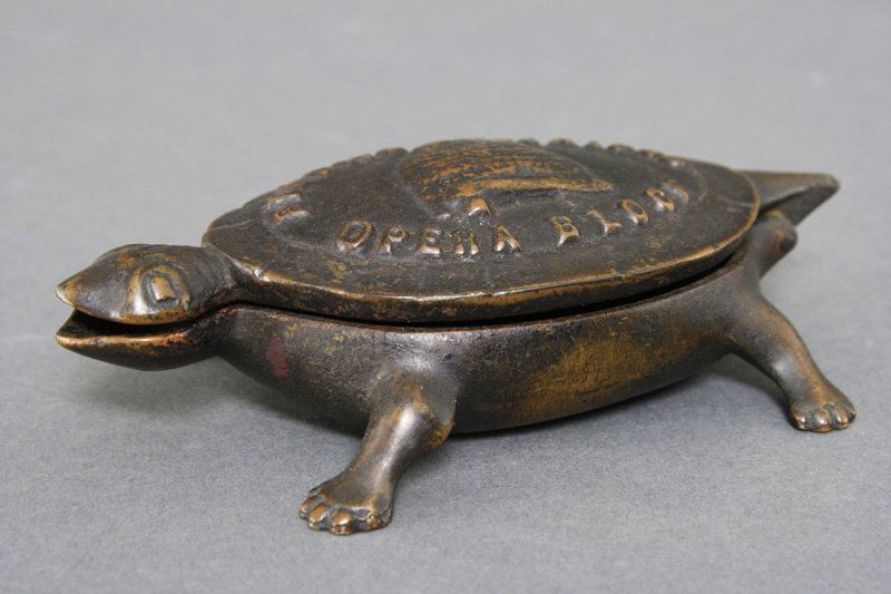 Beehive Clothiers Match Safe: American - Circa 1880 5 1/4" long. Material: Cast Iron