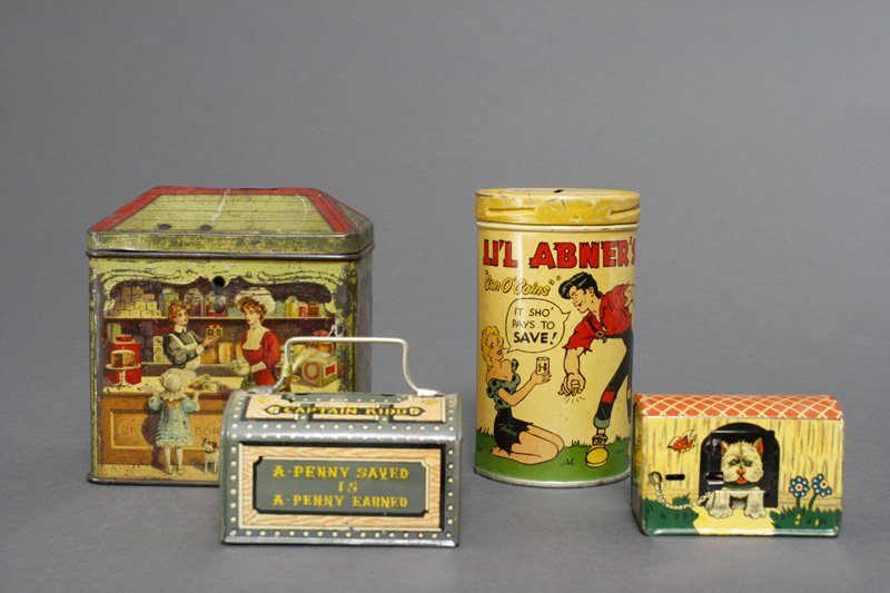 Lot: Four Tin Banks: English, Japanese and American Circa 1895 1950 The English one is a tea container/bank. Material: Tin