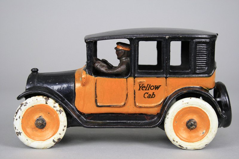 Yellow Cab Arcade Cast Iron: Arcade Mfg. Co. Freeport, Illinois - Circa 1925 This is a superior example of the 8” size cab. Material: Cast Iron