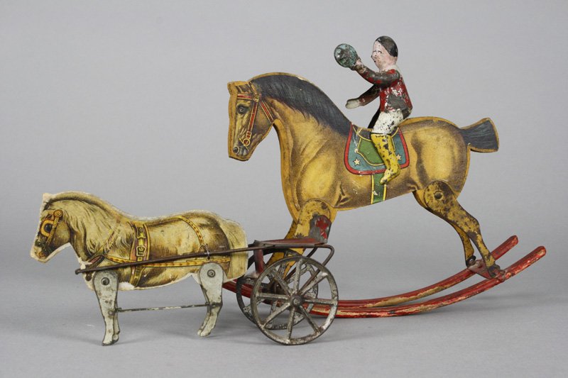 Lot: Sulky and Horse with Jockey Paper Litho: Gibbs Mfg. • Canton, Ohio - Circa 1915 The horse with jockey is 9” long and the sulky toy is 6.5” long. Material: Paper, Wood and Tin