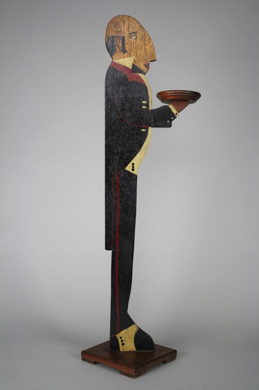 Butler Tip Tray Folk Art: American - Circa 1930 He is 34” tall. Material: Wood
