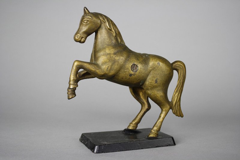 Prancing Horse on Platform: Arcade Mfg. Co. Freeport, Illinois - Circa 1910 The Horse is 7.25” tall. Material: Cast Iron