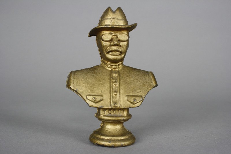 Theodore Roosevelt: Made by A. C. Williams Ravenna, Ohio - Circa 1920 Theodore is 5” tall. Material: Cast Iron