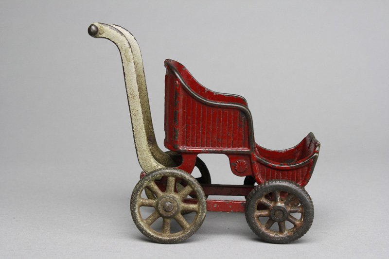 Kilgore Stroller: Westerville, Ohio - Circa 1925 It is 4” in length. Material: Cast Iron