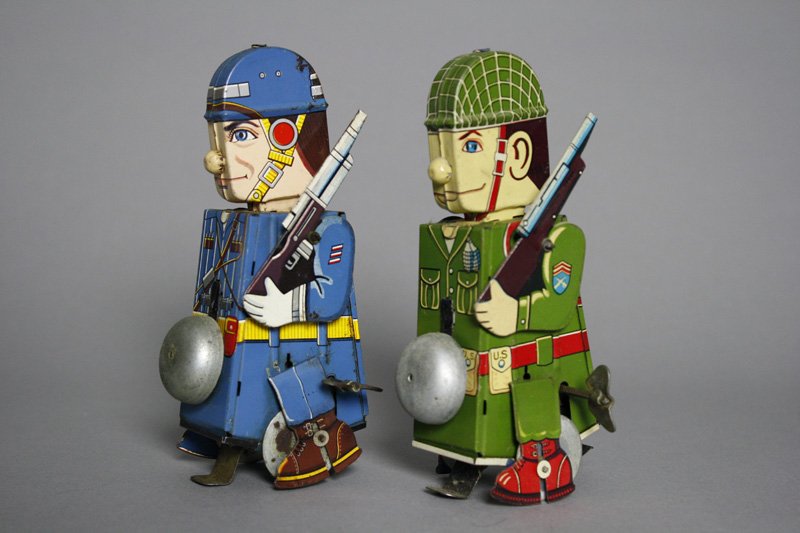 Two Mego Man Soldiers: Japanese - Circa 1960’s These little walkers are 6” tall and work well. Material: Tin