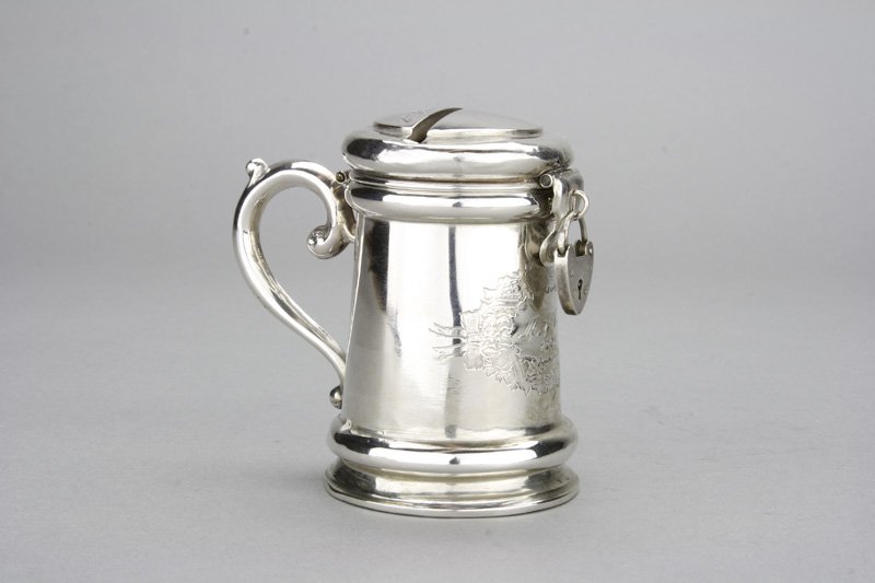 Sterling Silver Tankard: Russian - Dated 1881 Initials M. A. C. E. within garland. Bank is 3” tall. Material: Sterling Silver