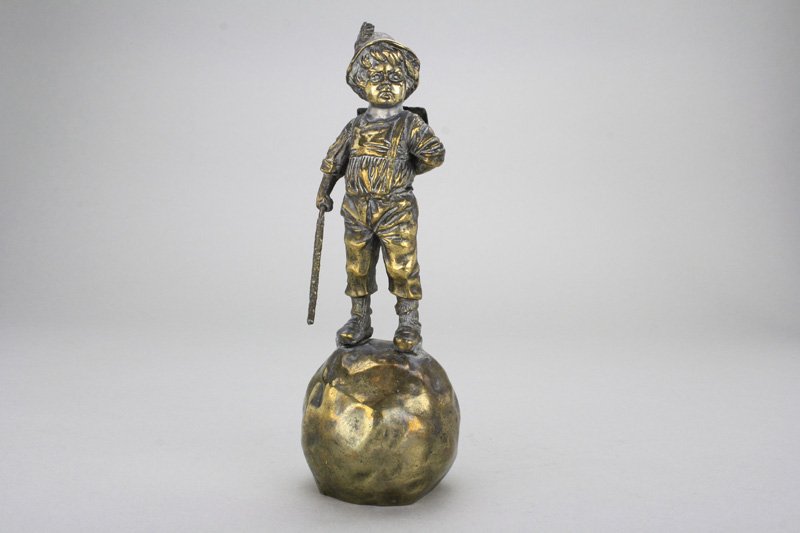 School Boy on Rock: Germany - Circa 1920’s Material: Brass and Tin