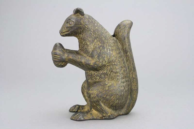 Squirrel with Nut: Ober Mfg. Co. Ohio - Circa 1910 A scarce and highly sought after bank. Ober was in business just a few years. Material: Cast Iron