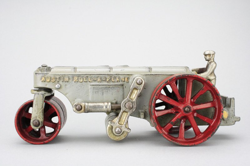 Austin Roll-a-Plane”: Arcade Mfg. Co. Freeport, Illinois - Circa 1930 A scarce toy in wonderful condition. It is 7.75” long. Material: Cast Iron
