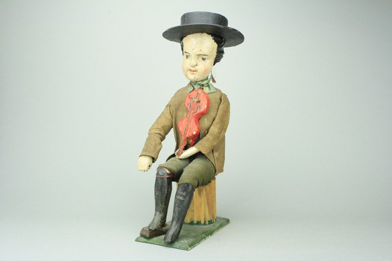 Prodigy Playing the Red Violin: Germany - Circa 1880’s - 11” tall Materials: Wood, Papier-mâché and Fabric