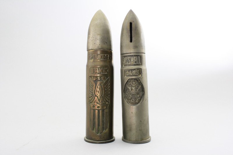 1.5” Shell / 1 Pounders Shell Still Bank: 7.75” Tall American - Circa 1920 Material: Cast Iron