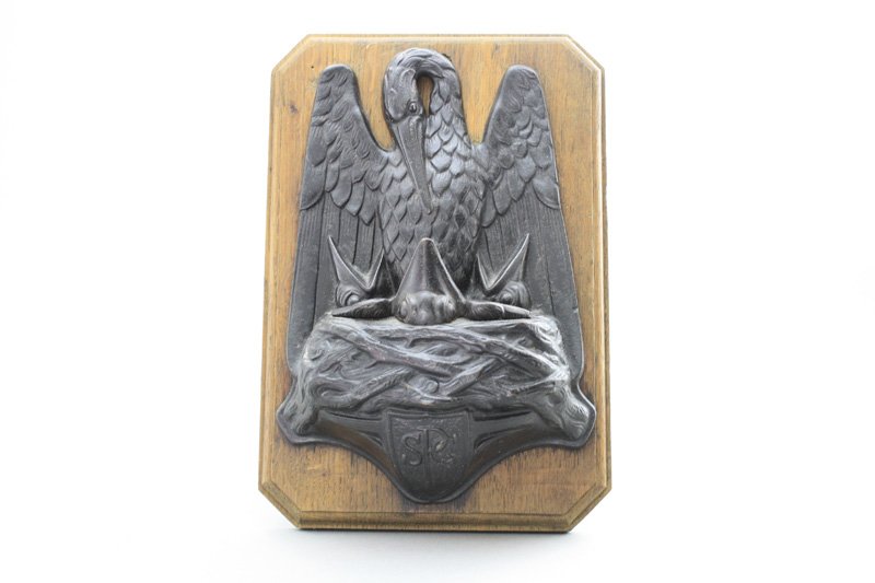 Hanging Stork (“SPG”) Still Bank: John Harper English - Circa 1914 A scarce bank that is always found mounted to a wooden base. It was used as an Alms Box by the Society for the Propagation of the Gospel. Material: Cast Iron and Wood