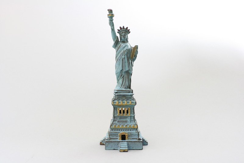 Large Blue Statue of Liberty Architectural Bank: Kenton Hardware Ohio - Circa 1915 - 9.625” Tall A superb example of the bank with great gold highlights. Material: Cast Iron