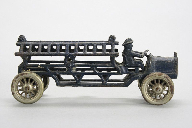 Hook & Ladder Cast Iron: American - Circa 1920 - 7.5” Long Material: Cast Iron