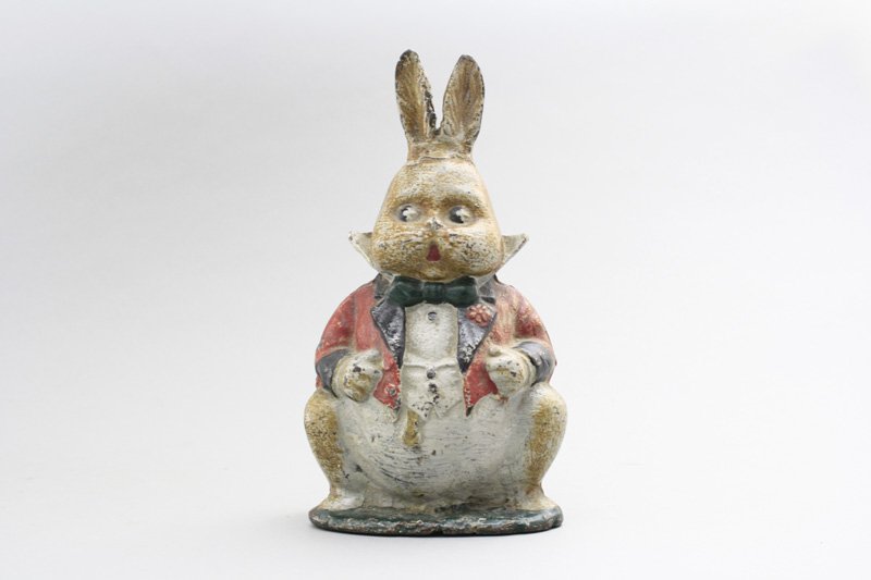 Grandpa Rabbit: Hubley Mfg. Co. Pennsylvania - Circa 1930 - 8.75” Tall This doorstop is really delightful and quite scarce. Material: Cast Iron