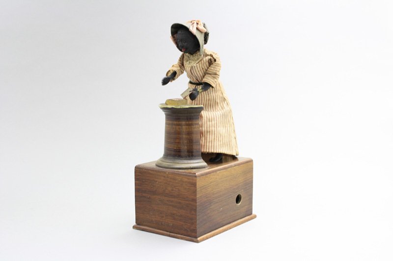Suffragette: Ives, Blakeslee Company - Connecticut - Circa 1875 - 9” Tall This black suffragette is based upon “Sojourner Truth” a girl born into slavery in Swartekill, New York, but escaped in 1826. She was