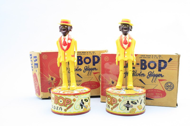Two “BeeBop” Jiggers-Boxed Louis Marx: New York - Circa 1948 - 10” Tall Both toys work well. Material: Tin and Plastic