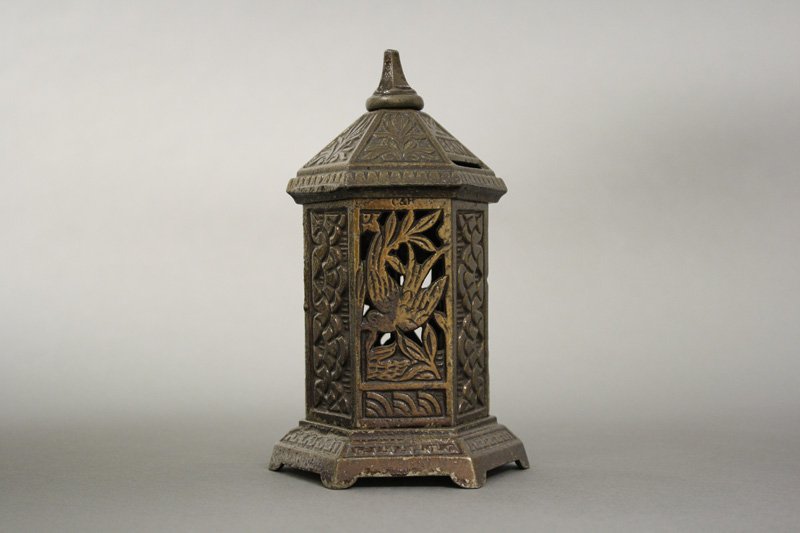 Space Heater with Bird: English - Circa 1895 - 6.5” H Material: Cast Iron