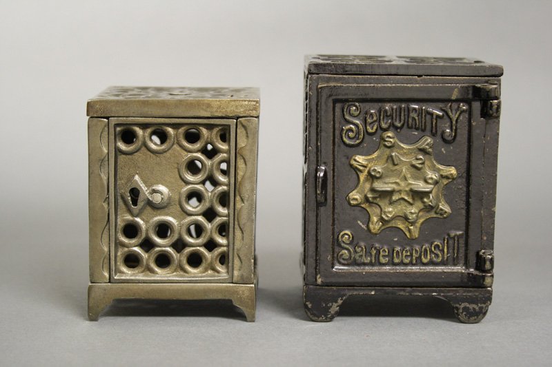Two Safe Banks: American / Kyser & Rex - Circa 1880s Included: Circle Grid Safe (3.375” H) and Security Safe Deposit (3.875” H). Material: Cast Iron