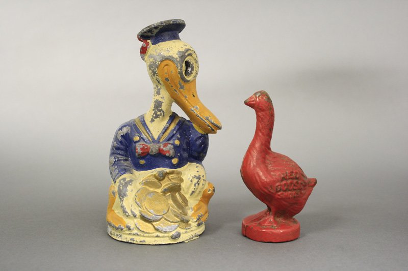 Donald Duck and Red Goose Shoes: American - Circa 1920 / 1930s Material: One is Lead, One is Cast Iron