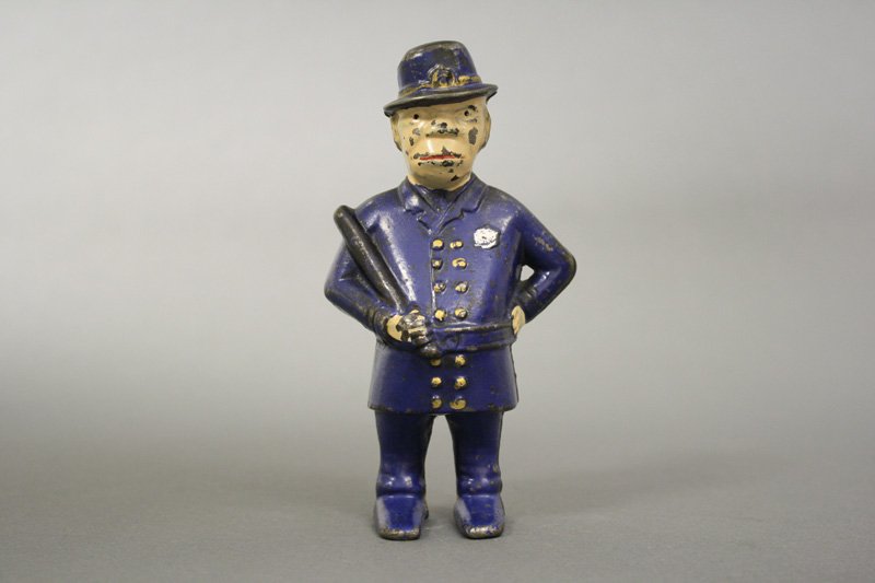 Mulligan the Cop with Advertising: A. C. Williams - Circa 1910 Advertising for Bennet & Fish. Material: Cast Iron