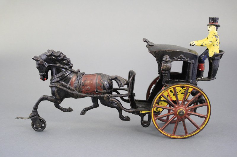 Hansom Cab: Pratt & Letchworth - Circa 1890 - 12.5” L A colorful and classic Pratt & Letchworth toy. Material: Cast Iron