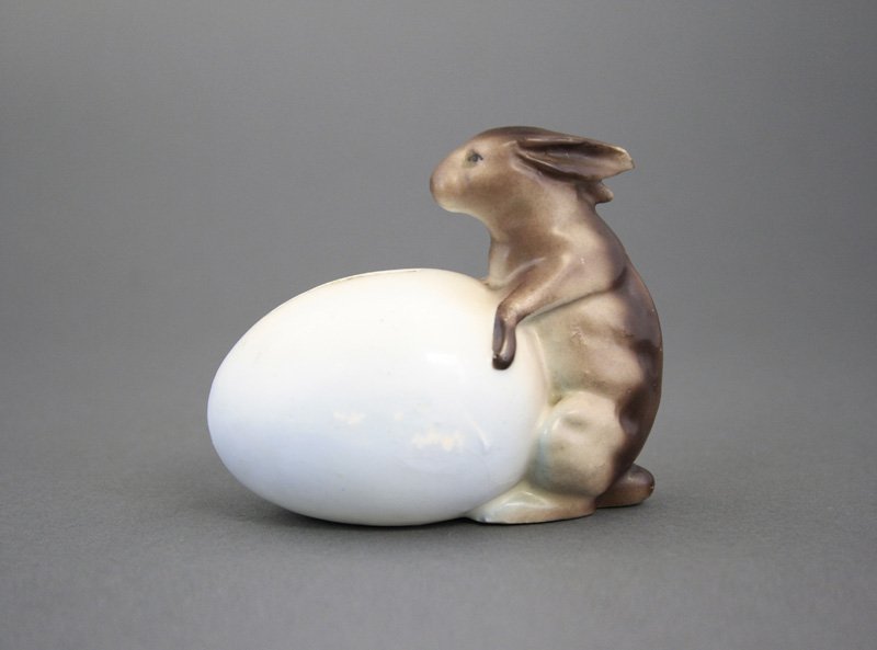 Rabbit by Egg: German - Circa 1920 Material: Glazed Bisque