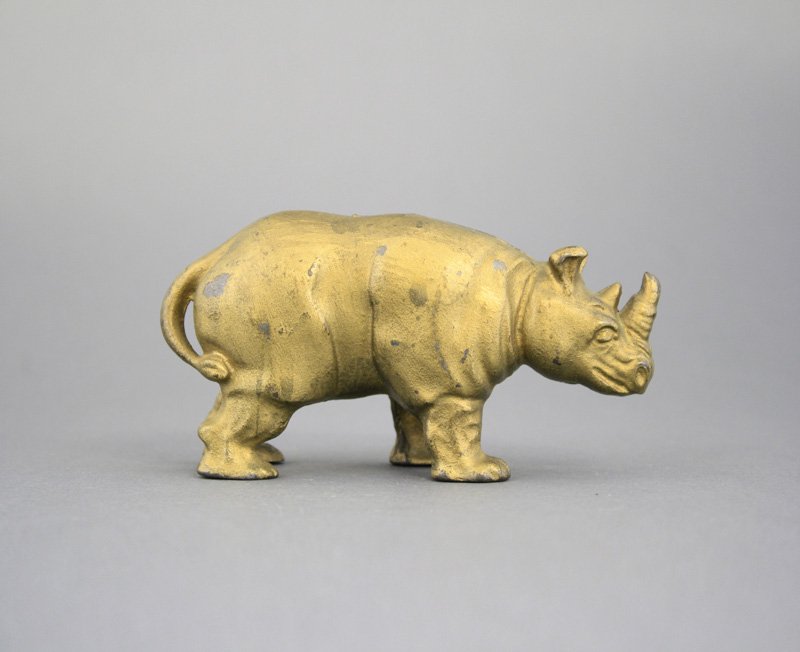 Rhino Bank: Arcade Mfg. Co. Freeport, Illinois - Circa 1915 Scarce in gold finish. Material: Cast Iron Provenance: Ralph Dye Collection
