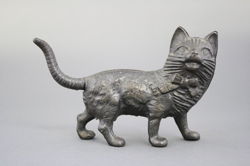 Cat with Long Tail: Grey Iron Casting Co. Pennsylvania - Circa 1910 This is a particularly sublime example of a very rare bank. Material: Cast Iron