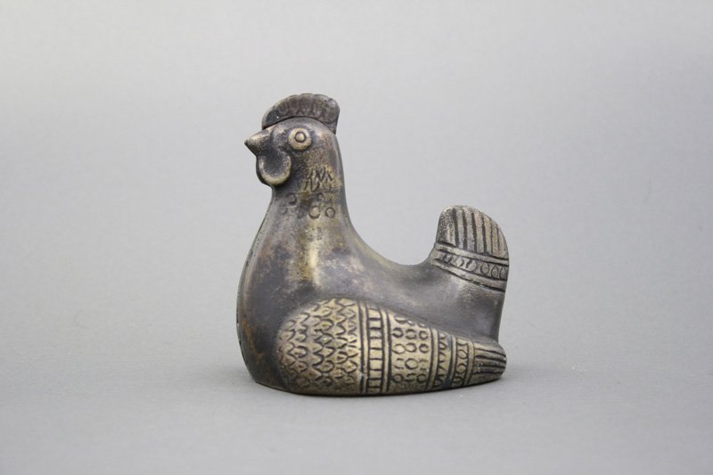 Seated Hen: American - Circa 1930’s - 4” H This is possibly a unique bank made by a small unknown foundry. Material: Cast Iron Provenance: Ralph Dye Collection