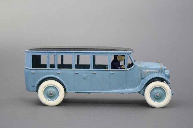Blue Bus: Dent Hardware Pennsylvania - Circa 1930 - 8.5” L An old toy painted in the 1960’s. Material: Cast Iron