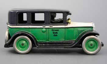 Green and White Buick Cab Bank: Arcade Mfg. Co. Freeport, Illinois - Circa 1925 - 8.125” L Material: Cast Iron