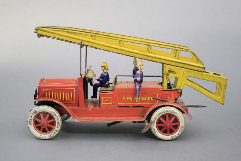 Hook & Ladder “Fire Brigade”: J. Distler German - Circa 1920’s - 11.25” L This is a wonderful windup toy with a telescoping ladder. Material: Tin