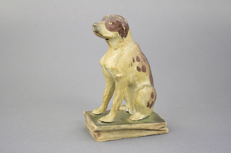 Squeak Toy - Seated Dog: German - Circa 1880’s - 6.5” H This is a fantastic early German squeak toy with an articulated mouth, that opens up slightly. The squeak sound is quite faint. Material: Wood, Papier mache and Gess