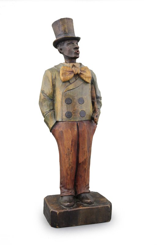 Black Whistler with Violin: German - Circa 1910 - 14” H Most whistling toys were made in cottage industry Germany in the period 1895 - 1920. This is an excellent, good working example with a strong whistle sound. Material: Woo