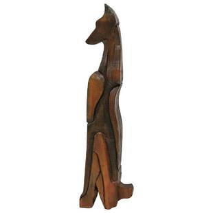 Doberman Pinscher Sculpture by George Mullen: Animal sculpture in red pine of a Doberman Pinscher dog by multi-disciplinary artist George Mullen. The sculpture is made like a puzzle with different carved pieces assembled together. A prolific