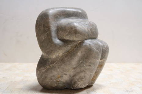 Evocative Grey Marble Sculpture: Evocative grey marble sculpture resembles a seated figure with bent leg resting it's head on folded arms. It's carved in a beautiful chunk of marble. Measures approximately 10.0" in diameter across