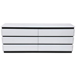 1970s Gloss White Lacquered Dresser by Rougier: White lacquered minimalist dresser features six pull out drawers. Has a black corrugated detail between each drawer. Made in the 1970s by Maison Rougier. Original Retail Price $4,800 