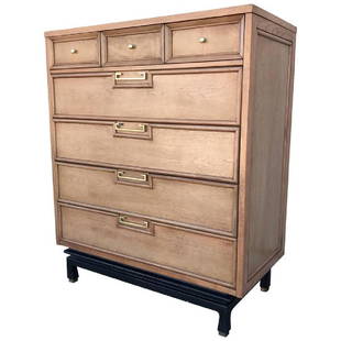 American of Martinsville Walnut Tallboy: 1960s walnut tall boy from Americans of Martinsville. Top section divided into three separate drawers with four larger drawers below. Brass knobs and handles. Original Retail Price $3,400 