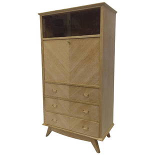 Mid-Century French Drop-Leaf Desk by Rene Gabriel: This Mid-Century secretaire is finished with book-matched oak, brass hardware, and a light ceruse finish. The top section features sliding glass doors, the middle opens on two drawers and one