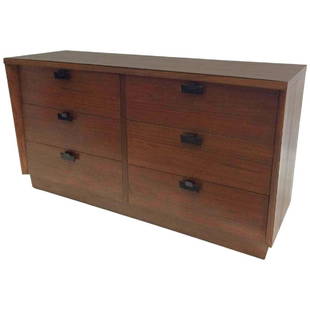 American of Martinsville Walnut Chest of Drawers: This dresser made of walnut features six drawers with black painted metal pulls. Very interesting lines and like always with American of Martinsville pieces very high-quality craftsmanship. 