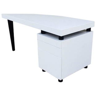 Italian Desk in Black & White Lacquer: Architectural three-drawer desk in white and black lacquer. Cylindrical legs, sail shaped desktop and cube with three drawers. Bottom drawer is set up to hold file folders. Original Retail