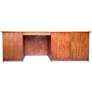 Large and Narrow Console Desk in Bubinga Wood: This desk is both functional and beautiful with its numerous storage spaces and gorgeous natural wood grain. The seat location is flanked by two pull-out drawers on either side, with a shelved